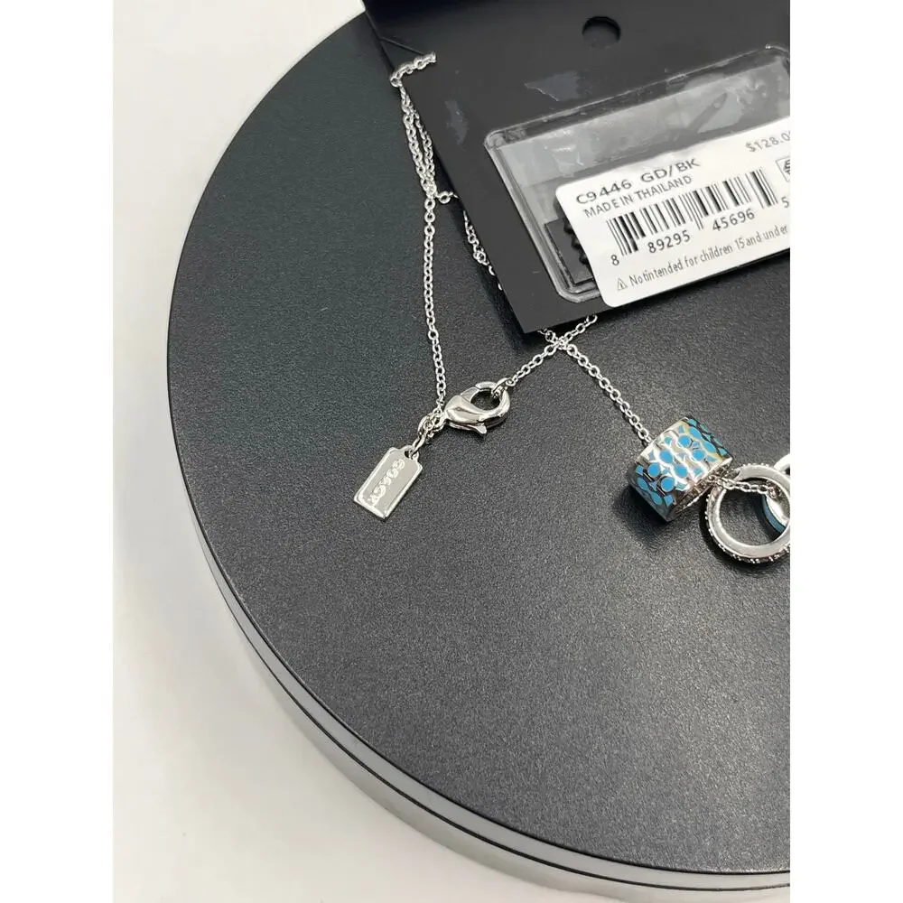 Coach Signature Black Enamel Crystal Rondell‎ Charm Silver Tone Necklace C1905